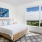 Bedroom with natural lighting and high ceilings