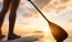 Person paddleboarding in the lake