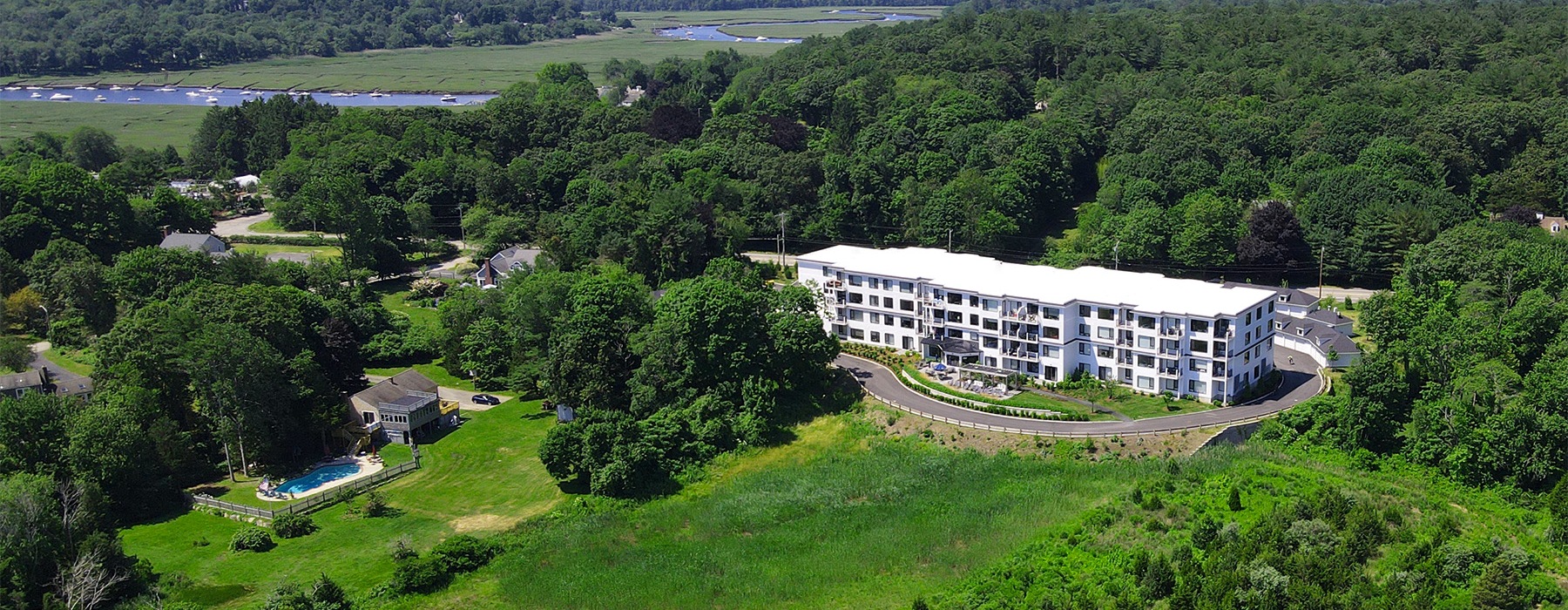 Aerial view of the property and lake 
